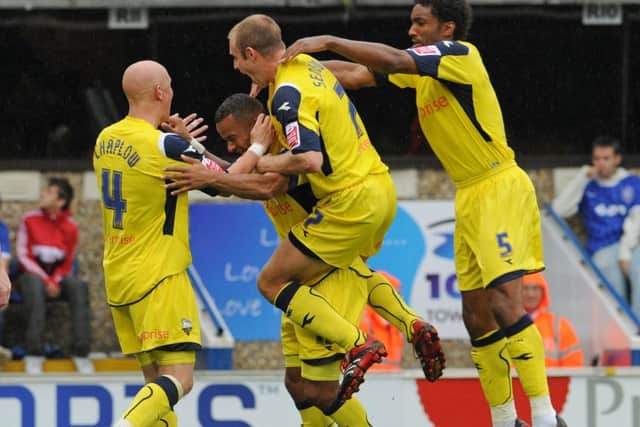 Simon Whaley is mobbed by team mates after scoring Preston's second goal