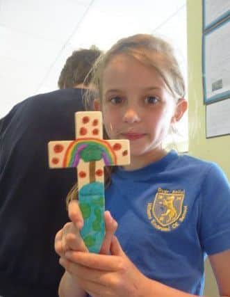 Over Kellet pupil Lexi Stephenson with her decorated cross