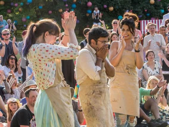 Kim-Joy (left) and Ruby as they celebrate Rahul (centre), the winning The Great British Bake Off 2018