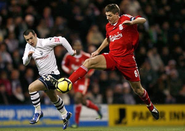Gerrard in action against PNE in the FA Cup third round at Deepdale in 2009