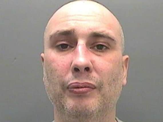 Jonathan Donne, 42, who has been jailed for life with a minimum of 31 years at Swansea Crown Court after he 'brutally' attacked and murdered pensioner John Williams during a robbery at his home in Bonymaen, Swansea. Photo credit: South Wales Police/PA Wire