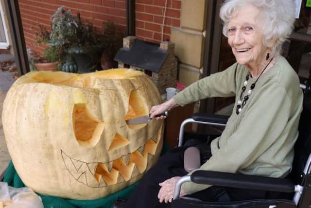 Hazel Gorman, a resident at Springfield, with the pumpkin