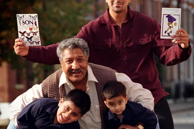 A 1998 picture of father and sons with wrestler Rajendra Singh