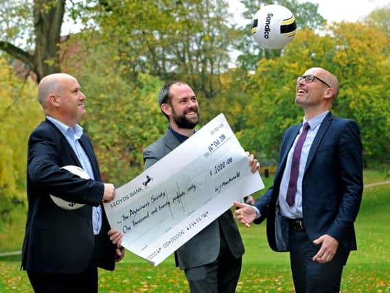 Will MacDonald of Lloyds Bank, Ian McCulloch of Begbies Traynor and Rob Walters of Lloyds Bank enjoy a kick-about in Winckley Square, Preston