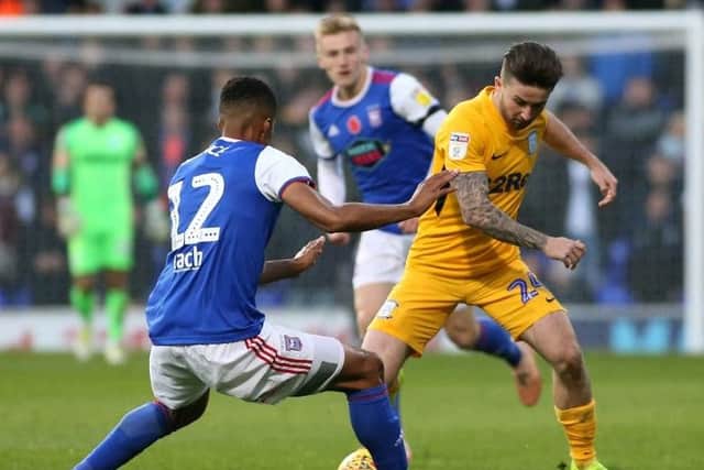 Sean Maguire battles for the ball against Ipswich