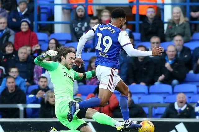 Chris Maxwell was adjudged to have brought down Jordan Roberts for Ipswich's penalty at Portman Road