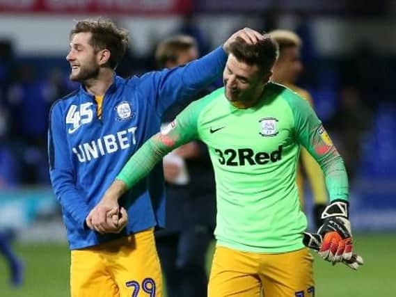 Tom Barkhuizen congratulates Paul Gallagher on his starring role in Preston's draw at Ipswich