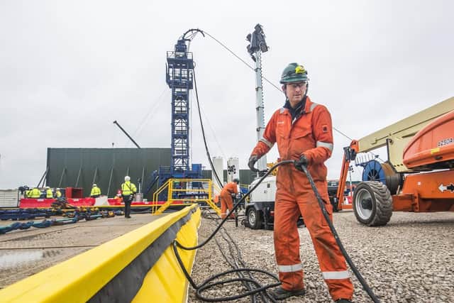 A worker at the Cuadrilla fracking site in Preston New Road,  Lancashire