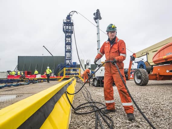 A worker at the Cuadrilla fracking site in Preston New Road,  Lancashire