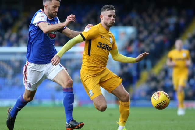 Preston North End's Alan Browne gets away from Ipswich Town's Cole Skuse