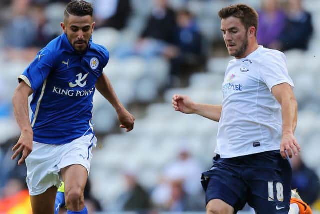 Andy Little takes on Riyad Mahrez in PNE's friendly with Leicester in August 2014