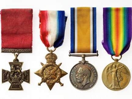 Pte William Young's medals, including, left, his Victoria Cross