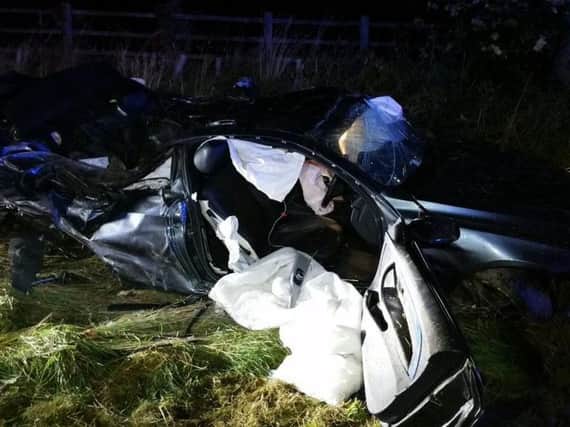 The BMW was left badly damaged following the "catastrophic" crash on the M6 in Lancashire. Photo: Lancashire Road Police