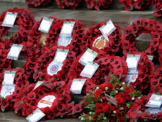 Lancashire paused to remember the sacrifices made by the county's war heroes as the nation fell silent to mark the 100th anniversary of the end of the First World War