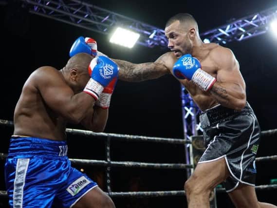 Damian Chambers goes on the attack against Elvis Dube. Picture: Chris Roberts for MTK Global