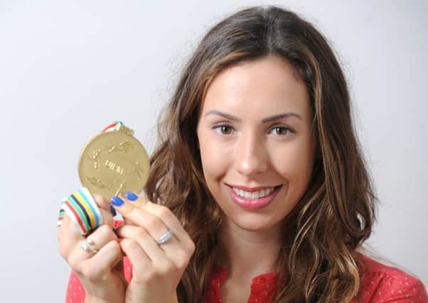 Samantha Murray pictured in 2014 with her Modern Pentathlon World Championship gold medal (photo: Neil Cross)