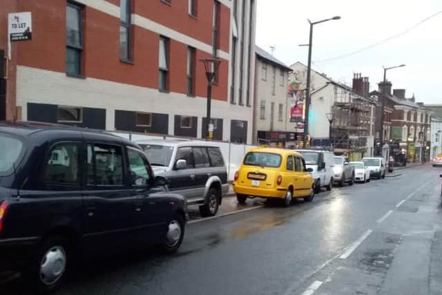 Cars parked in a taxi rank in Preston city centre. Cabbies have said a lack of council traffic wardens is making the problem worse not better