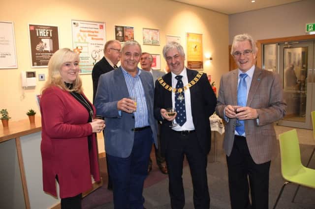 Preston Mayor, Coun Trevor Hart, with trustees and members of Preston Playhouse celebrating the completion of major works to update and improve the foyer areas of the theatre.
