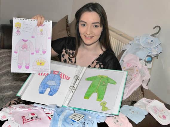 Chorley mum Alex Chetwynd with her designs for the clothing she is creating for premature babies
