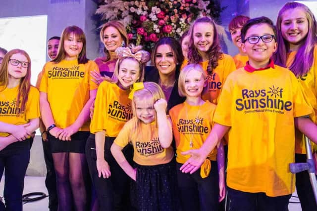 Charlie Catterall (with gold bow headband) with the rest of the Rays of Sunshine Childrens Choir
