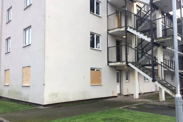 Three windows on the ground floor at Conway House were boarded up after the attack