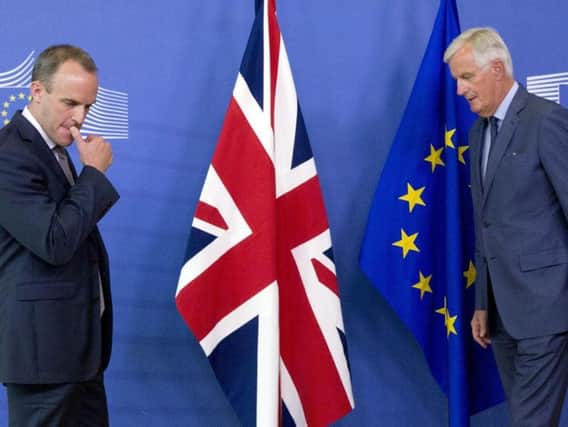 Former Secretary of State for Exiting the European Union Dominic Raab, left, and EU chief Brexit negotiator Michel Barnier