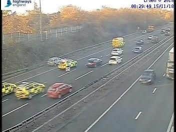 Three-miles of tailbacks on the M6 after trailer carrying digger collides with car
