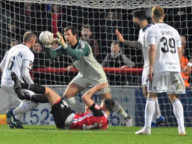 Morecambe and FC Halifax Town face an FA Cup replay on Tuesday