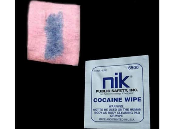 A cocaine wipe kit. The blue indicates that traces of the substance have been found from wherever it was tested