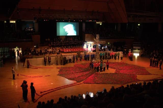 Solemn remembrance as part of 'Armistice - The Great War Remembered' at Preston's Guild Hall