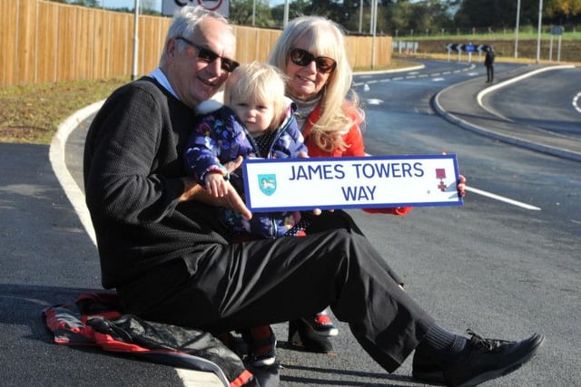 Glynis and David Castle, grandchildren of James Towers, and Chloe Nelson, his great great grandaughter at the opening of the road in his memory