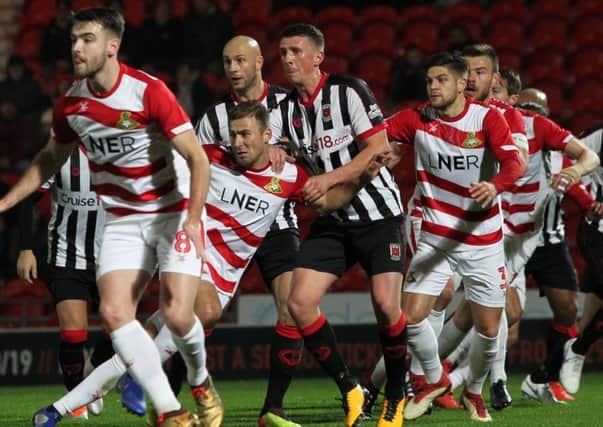 Chorley were handicapped in their first round FA Cup replay against Doncaster after having key players suspended