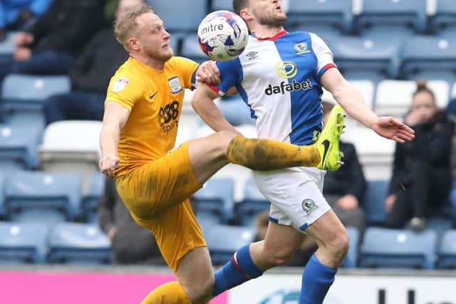 Tom Clarke battles with Craig Conway during Preston's last meeting with Blackburn back in March 2017