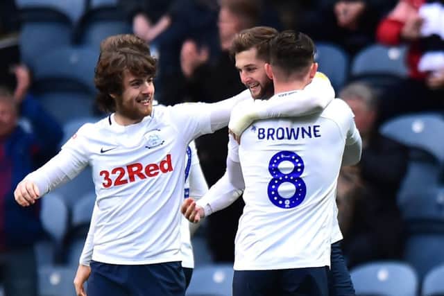 Ben Pearson (left) and Alan Browne congratulate Tom Barkhuizen after his goal against Blackburn