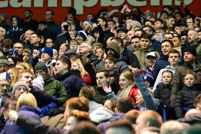 Preston supporters watch their side's win over Blackburn