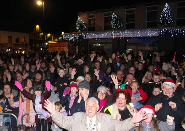 Town mayor Coun Peter Hardy leads the crowd at the Kirkham Christmas lights switch-on