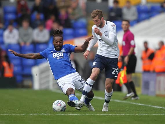 Tom Barkhuizen battles with Jacques Maghoma during last year's game between the sides at St Andrew's