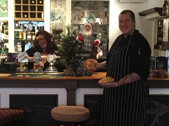 Sammy Rensburg and Chef Mark Hughlock at The Green Man, in Inglewhite, holding two  home made mince pies