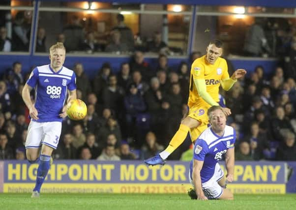 Preston North End's Graham Burke gets a shot on goal