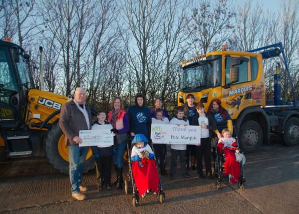 Members of High 5 say a big thank you to Pete Marquis for helping to raise Â£64,000: Pete Marquis, Pip Kiley, Sarah Kiley, Harry Lowe, Nannette Holliday, Izzy Holliday, Laura Finch (Trustee) with Jenson Finch, Ben Lowe and Emma Lowe. Twins Arthur and Alfie.