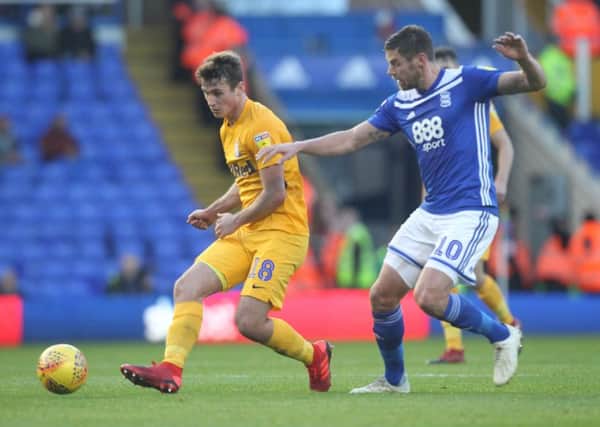 Ryan Ledson battles with Birmingham City's Lukas Jutkiewicz