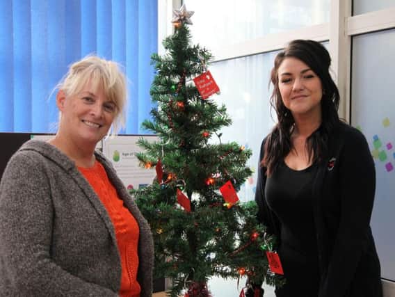 Progress Housing Group staff Chrissy and Danielle at the Wish Tree Appeal at the Groups office in Leyland