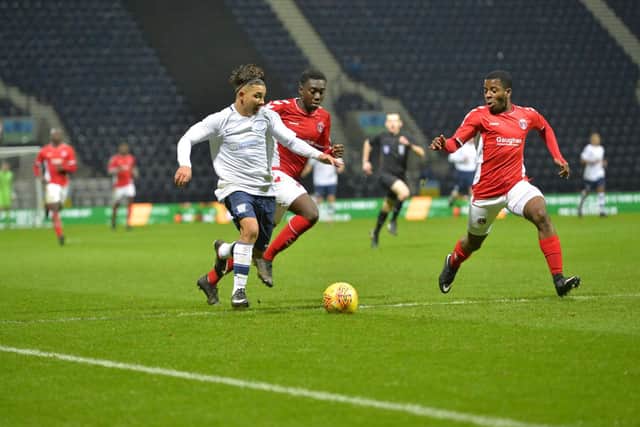 Preston midfielder Tyrhys Dolan takes on the Charlton defence