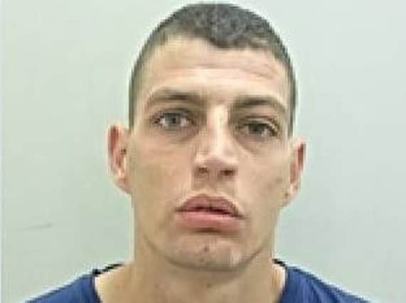 Michael Cooper, 29, was wanted by police after an alleged machete attack in Deepdale.