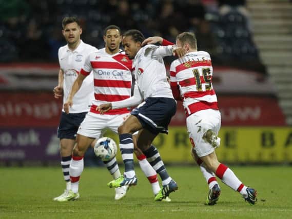 Danile Johnson in action in PNE's last meeting with Doncaster in 2015
