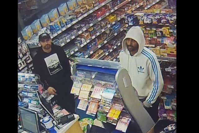 The two men wanted by police.
