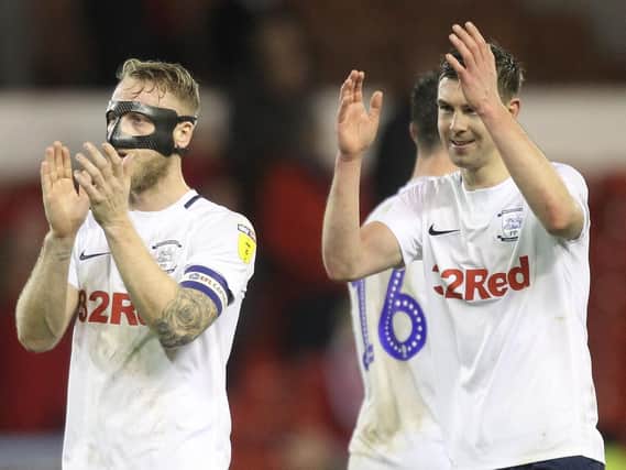 Tom Clarke and Paul Huntington salute the PNE fans after the win at Nottingham Forest