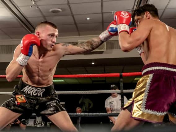 Reece MacMillan on his way to victory over Ricky Rose in Wigan. Picture: Karen Priestley Photography