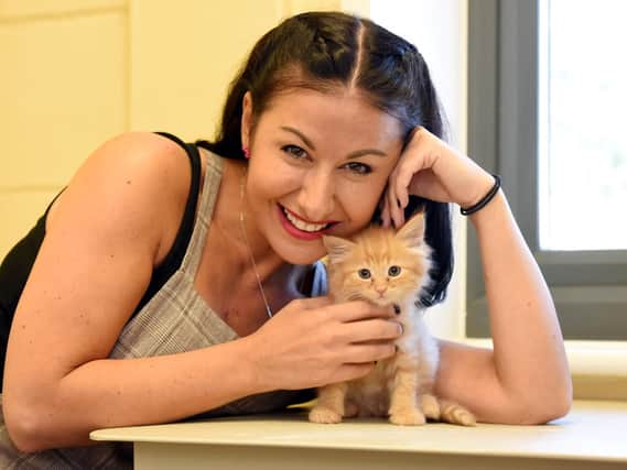 Hayley Tamaddon offers her support to the Blue Cross Medal 2019 campaign at the animal charity's Rehoming Centre near Thirsk, North Yorkshire