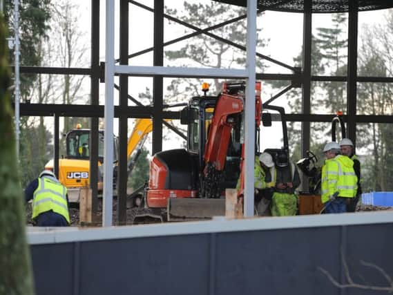 Workers putting together the framework for the new Lidl store in Clayton-le-Woods, Chorley